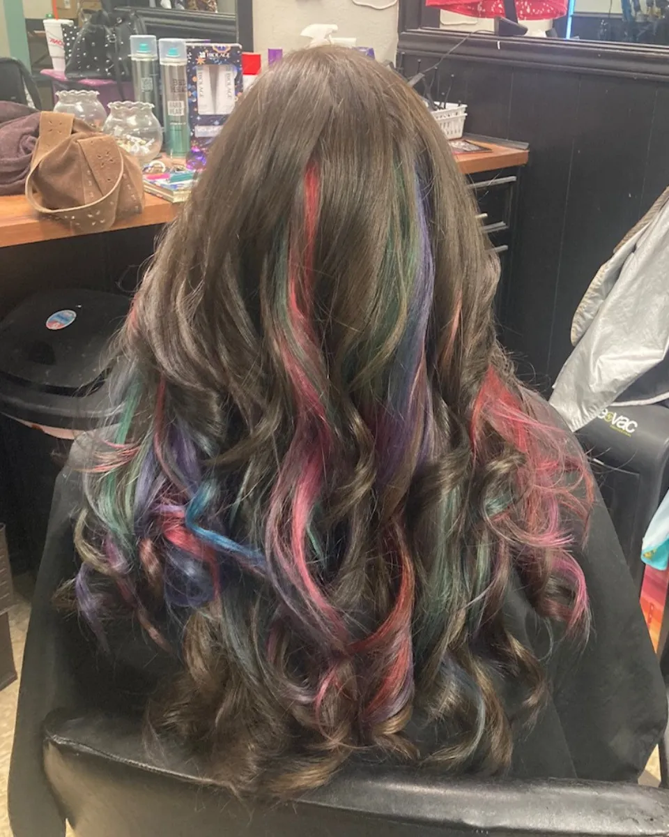 Brunette waves with teal, violet, and magenta vivid color after transformation