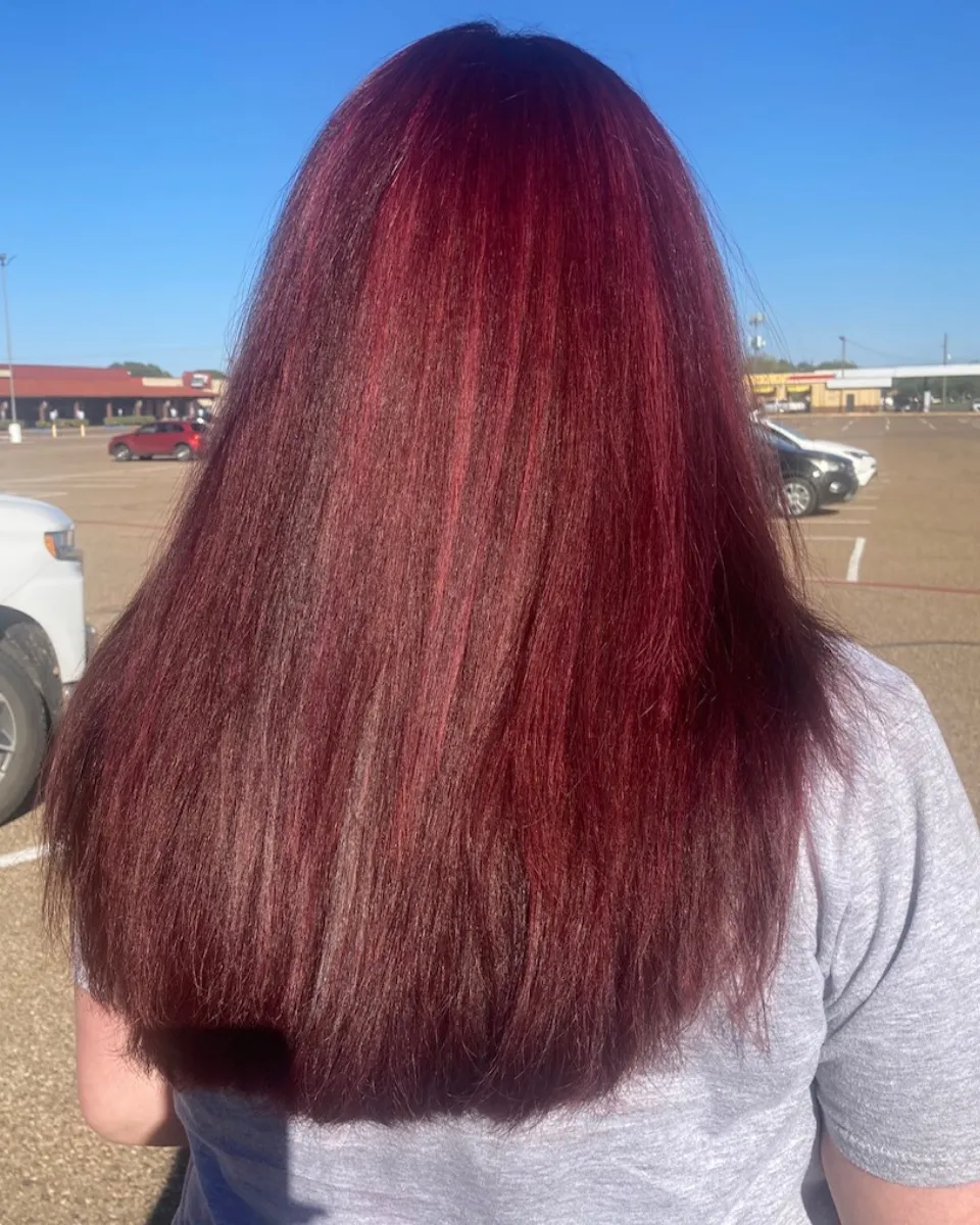 Long wine-red hair after full-color transformation